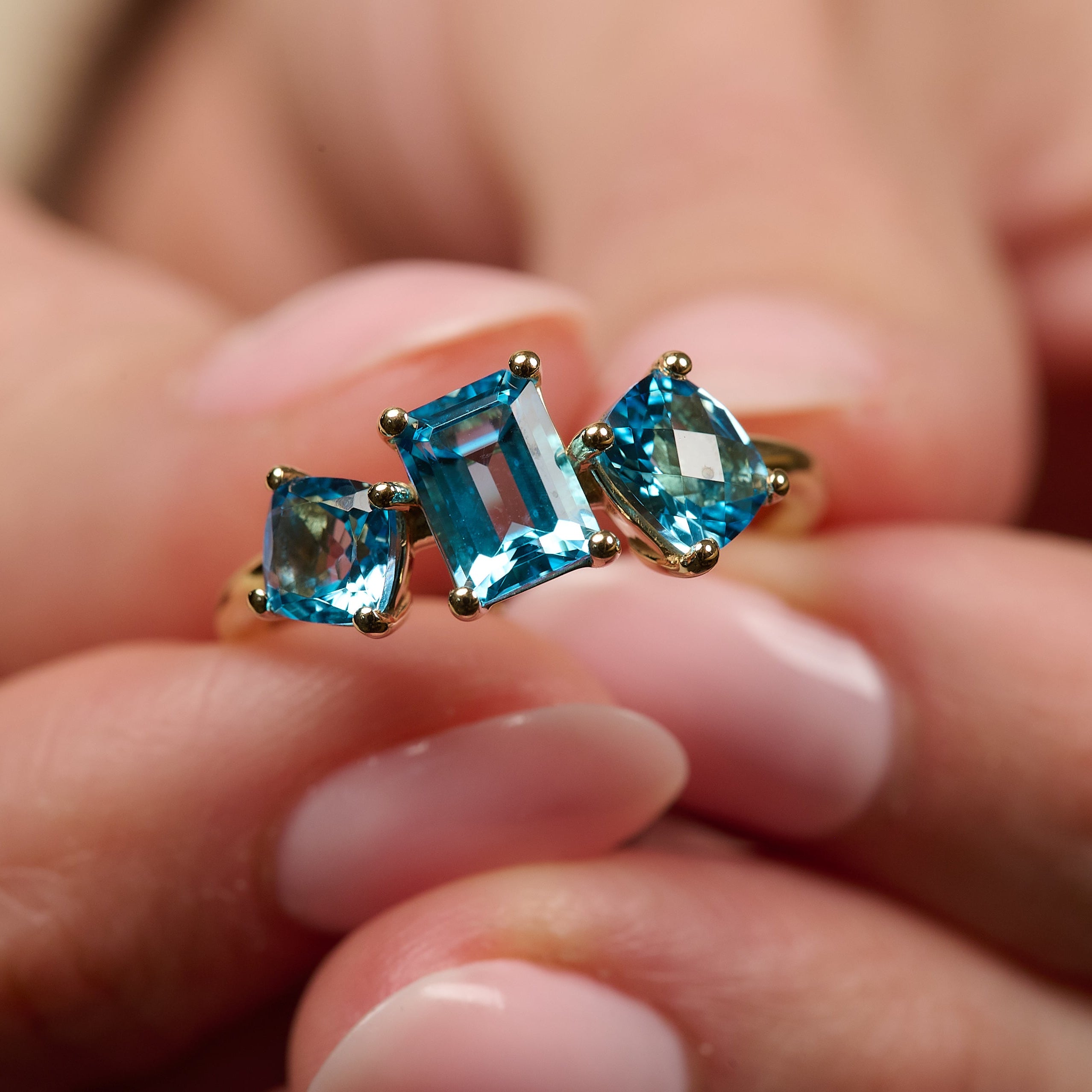 Fun ring in yellow, rose or white gold set with 3 Swiss blue topaz