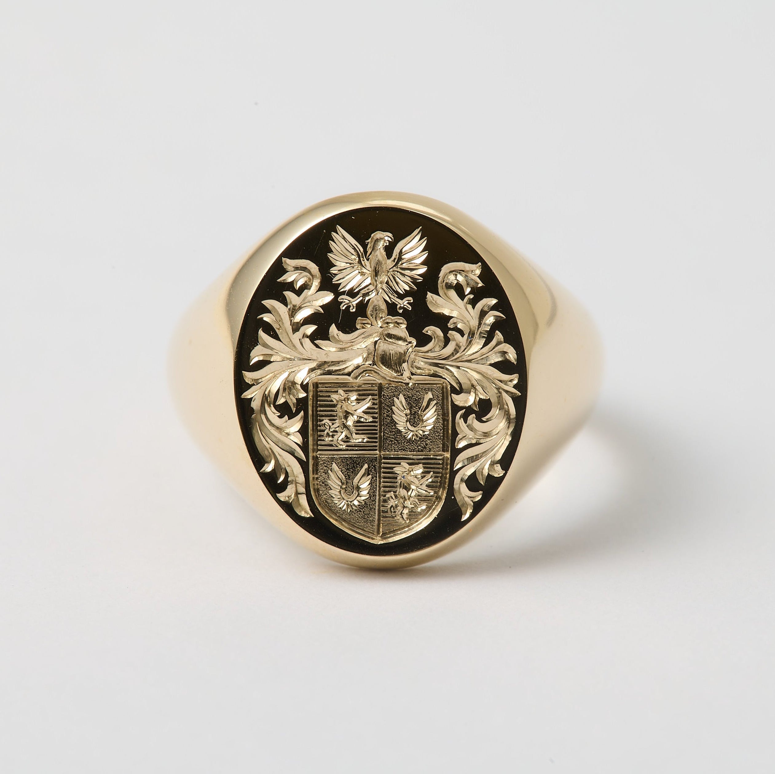 Yellow gold signet ring with a hand engraved Coat-Of-Arms